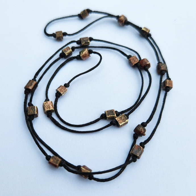 Brass Mataono Pirepire necklace.